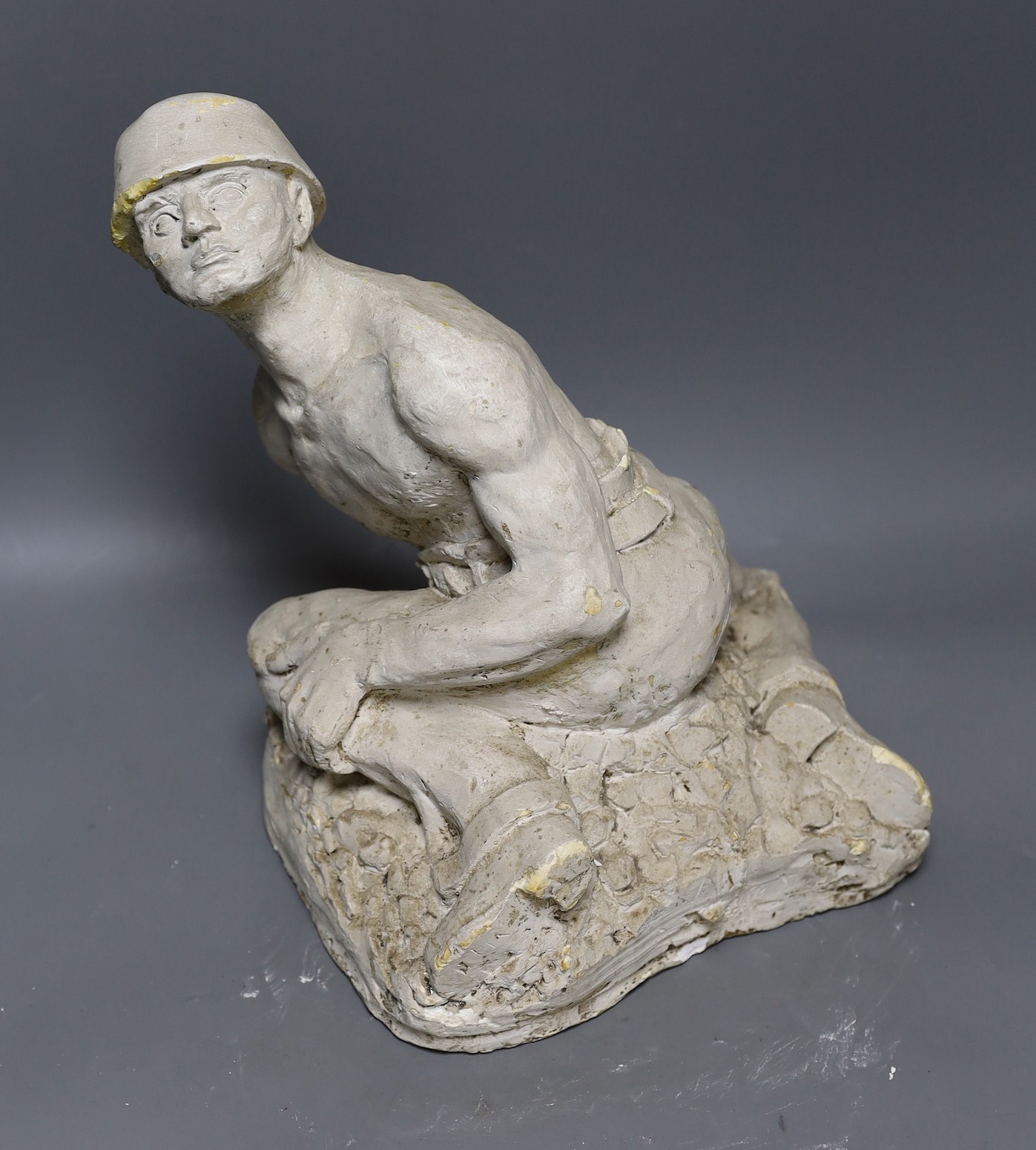 A plaster cast model of a miner, Brutaluit manner, signed L.S Odoarde? 29cm